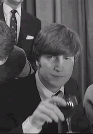 John Lennon drinks tea